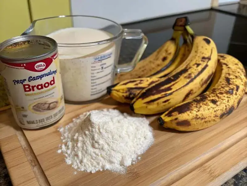 Ingredients for making 3 ingredient banana bread on a kitchen countertop.